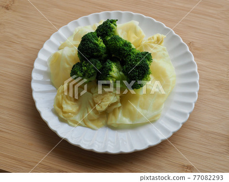 Fresh organic vegetables green broccoli and cabbage Fresh organic vegetables green broccoli and cabbage 77082293