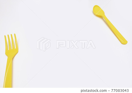 close up of plastic spoons close up of plastic spoons 77083043
