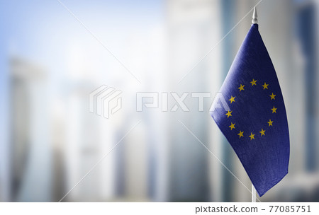Small national flags of the European Union on a light blurry background Small national flags of the European Union on a light blurry background 77085751