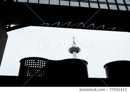 Shot of Kyoto Tower in front of JR Kyoto station in Shimogyo-ku, Kyoto-shi Shot of Kyoto Tower in front of JR Kyoto station in Shimogyo-ku, Kyoto-shi 77092415