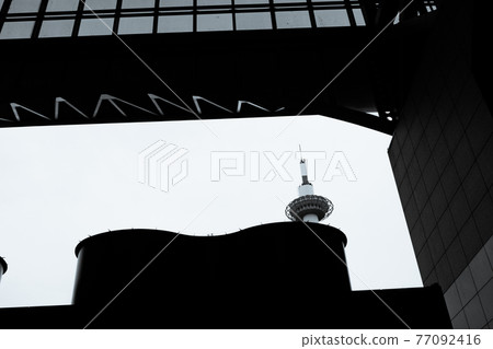 Shot of Kyoto Tower in front of JR Kyoto station in Shimogyo-ku, Kyoto-shi Shot of Kyoto Tower in front of JR Kyoto station in Shimogyo-ku, Kyoto-shi 77092416