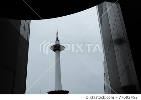 Shot of Kyoto Tower in front of JR Kyoto station in Shimogyo-ku, Kyoto-shi Shot of Kyoto Tower in front of JR Kyoto station in Shimogyo-ku, Kyoto-shi 77092452