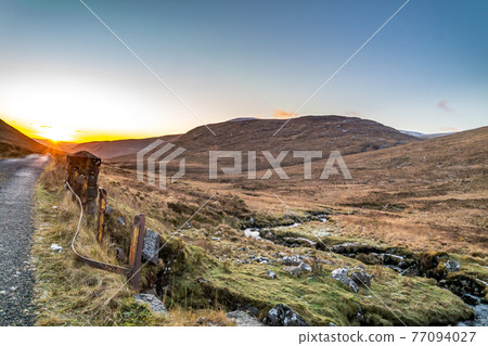 Winter sunset at the Glenveagh National Park in County Donegal - Ireland 77094027
