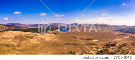 Aerial view of peatbog between Maas and Glenties in County Donegal - Ireland Aerial view of peatbog between Maas and Glenties in County Donegal - Ireland 77094048