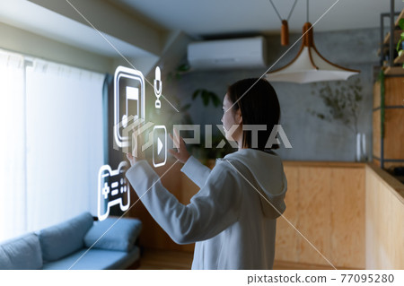 Woman spending time at home 77095280