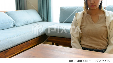 Woman spending time at home Woman spending time at home 77095320
