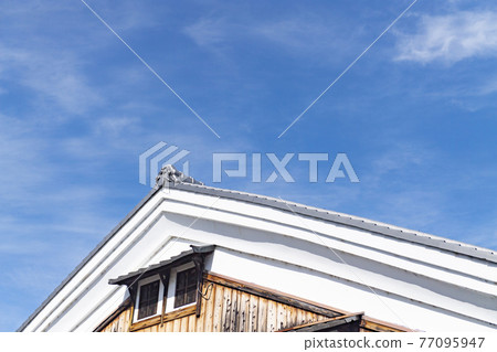 Dozo building and blue sky 77095947