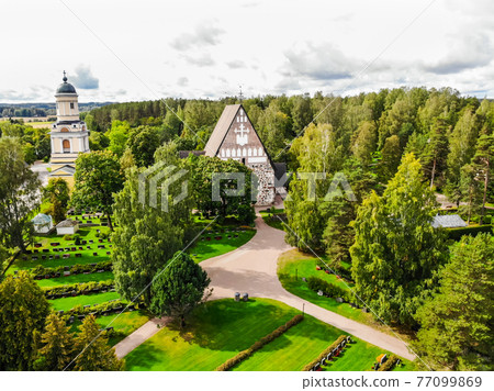 Hollola, Finland - 9 September 2019: Aerial view of old medieval stone church of St. Mary in Hollola, Finland 77099869