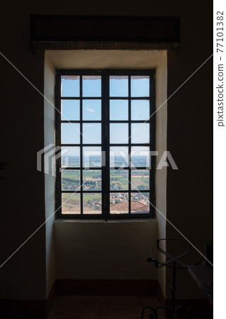 External view of an ancient vintage window of a medieval town in Italy, Europe. External view of an ancient vintage window of a medieval town in Italy, Europe. 77101382