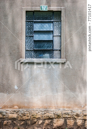 External view of an ancient vintage window of a medieval town in Italy, Europe. External view of an ancient vintage window of a medieval town in Italy, Europe. 77101417