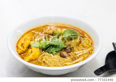 Simple and delicious curry mee or noodle, popular cuisine in Malaysia Simple and delicious curry mee or noodle, popular cuisine in Malaysia 77101440