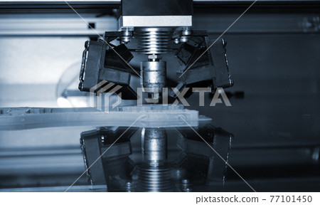 3D printer print isolated objects on mirror reflective surface close-up. 3D printer print isolated objects on mirror reflective surface close-up. 77101450