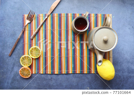 Top view of ginger tea on wooden background. Top view of ginger tea on wooden background. 77101664