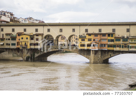 Italy Ponte Vecchio on a rainy day 77103707