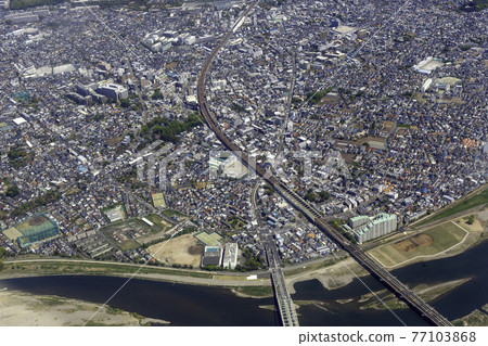 Aerial view from Izumi-Tamagawa Station on the Odakyu Line toward Komae Station Aerial view from Izumi-Tamagawa Station on the Odakyu Line toward Komae Station 77103868