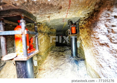 Jack up due to land subsidence of a house Jack up due to land subsidence of a house 77105276
