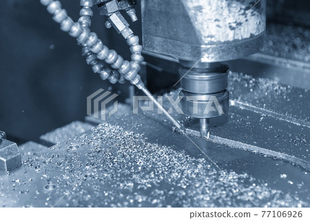 The  CNC  milling machine cutting  the mold parts. 77106926