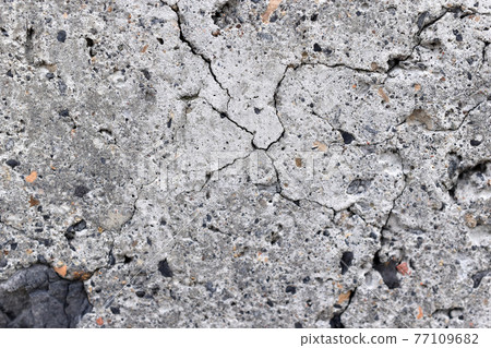 The surface of an old cinder block falling apart The surface of an old cinder block falling apart 77109682