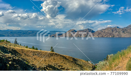 Panoramic view over Okanagan lake on a summer day Panoramic view over Okanagan lake on a summer day 77109990