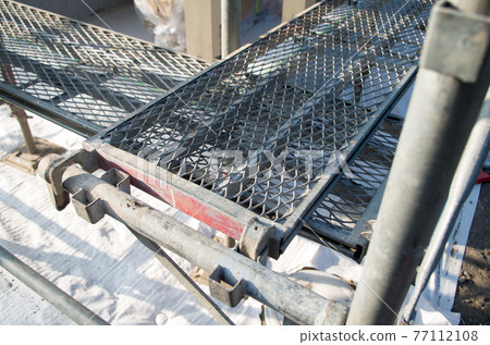 Construction site scaffolding 77112108