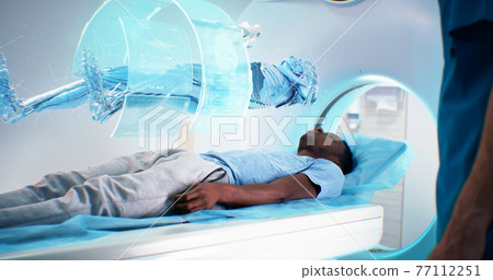 Black man during futuristic full body CT scan Black man during futuristic full body CT scan 77112251