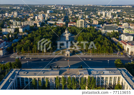 Aerial view of Government House and Cathedral Park in the center of Chisinau, capital of Moldova, at sunset Chisinau, Moldova Aerial view of Government House and Cathedral Park in the center of Chisinau, capital of Moldova, at sunset Chisinau, Moldova 77113655
