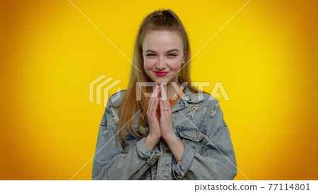 Sneaky cunning girl with tricky face scheming evil plan, thinking over villain idea, jokes, pranks Sneaky cunning girl with tricky face scheming evil plan, thinking over villain idea, jokes, pranks 77114801