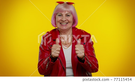 Senior rocker old woman wish for good luck waiting lottery winning, great fortune, celebrating happy 77115454