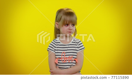 Upset disappointed kid child girl with tears on eyes cries from despair sad because of unfair things Upset disappointed kid child girl with tears on eyes cries from despair sad because of unfair things 77115890