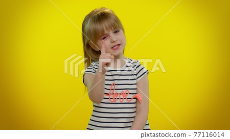 Kid child shakes finger and saying no, be careful, scolding, giving advice to avoid danger mistake 77116014