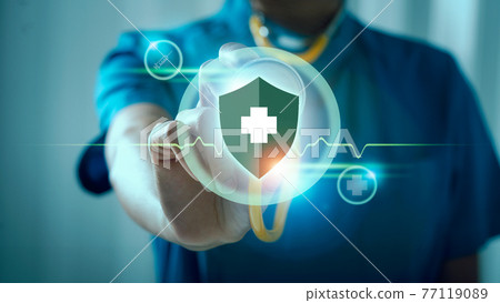 Medical doctor female holding stethoscope, immunity shield for protection from virus and bacterias, virus germs and prevention disease. 77119089