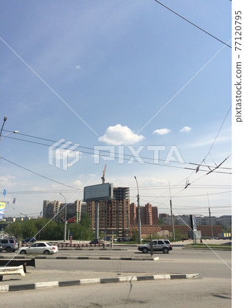 Beautiful blue sky in the modern city at summer time. Beautiful blue sky in the modern city at summer time. 77120795