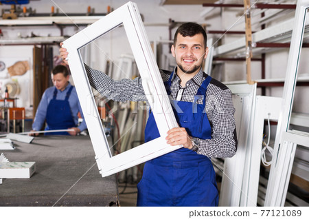 Workman showing PVC manufacturing output Workman showing PVC manufacturing output 77121089