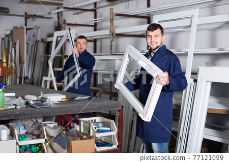 Two men professional labours with finished PVC profiles and windows 77121099