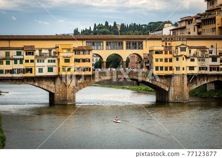 The Medieval Ponte Vecchio and Arno River in Florence Tuscany Italy The Medieval Ponte Vecchio and Arno River in Florence Tuscany Italy 77123877