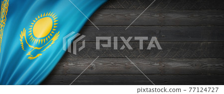 Kazakhstan flag on black wood wall banner Kazakhstan flag on black wood wall banner 77124727