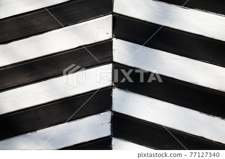 Photo of wooden boards painted in black and white Photo of wooden boards painted in black and white 77127340