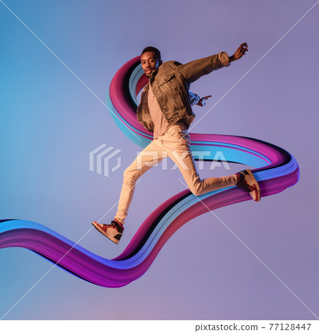 Stylish man with long fluid flood on gradient background. Negative space to insert your text. Modern design. Contemporary colorful and conceptual bright art collage. Stylish man with long fluid flood on gradient background. Negative space to insert your text. Modern design. Contemporary colorful and conceptual bright art collage. 77128447