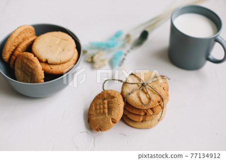 Handmade oatmeal cookies. Traditional freshly baked cookies. Junk-food, culinary, baking and eating concept.  77134912