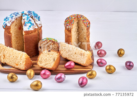 Piece of easter cakes with white icing. Piece of easter cakes with white icing. 77135972