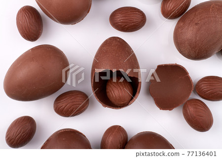 Top view pile of chicolate eggs. Top view pile of chicolate eggs. 77136401