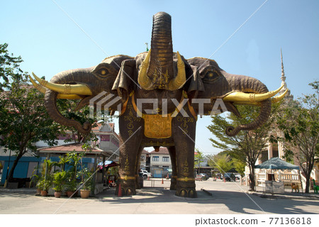 Large outdoor statue of Erawan elephant three headed in Wat Bang Chak , Thailand. Which made the entrance to the parking lot. 77136818