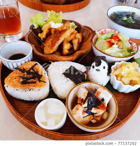 Japanese fried chicken mentaiko rice balls and salad plate meal 77137202