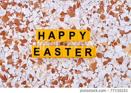 Shards of many broken eggs. 77138281