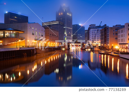 Milwaukee, Wisconsin, USA downtown skyline on the Milwaukee River 77138289