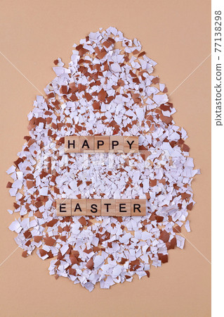 Happy easter and eggshells. Collection of eggshell pieces. 77138298
