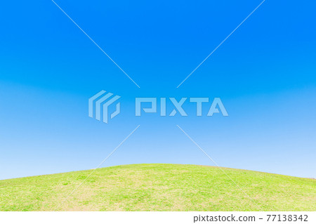 Blue sky and fresh green hills Blue sky and fresh green hills 77138342