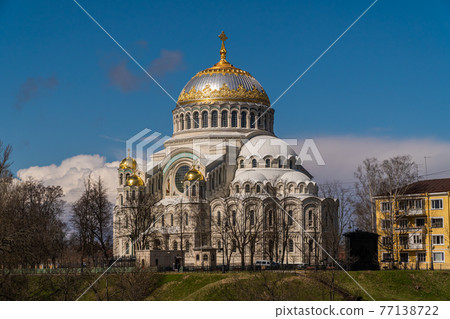 Russia. April 28, 2021. Spring view of the St. Nicholas Naval Cathedral on a fine sunny day from the Summer Garden in Kronstadt. Russia. April 28, 2021. Spring view of the St. Nicholas Naval Cathedral on a fine sunny day from the Summer Garden in Kronstadt. 77138722