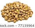 A set of salted and roasted pistachio seeds on a white background. Perfect shot for vegan diet, wellness and healthy eating. 77139964