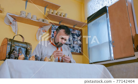 Potter making clay figure for board game Potter making clay figure for board game 77142404